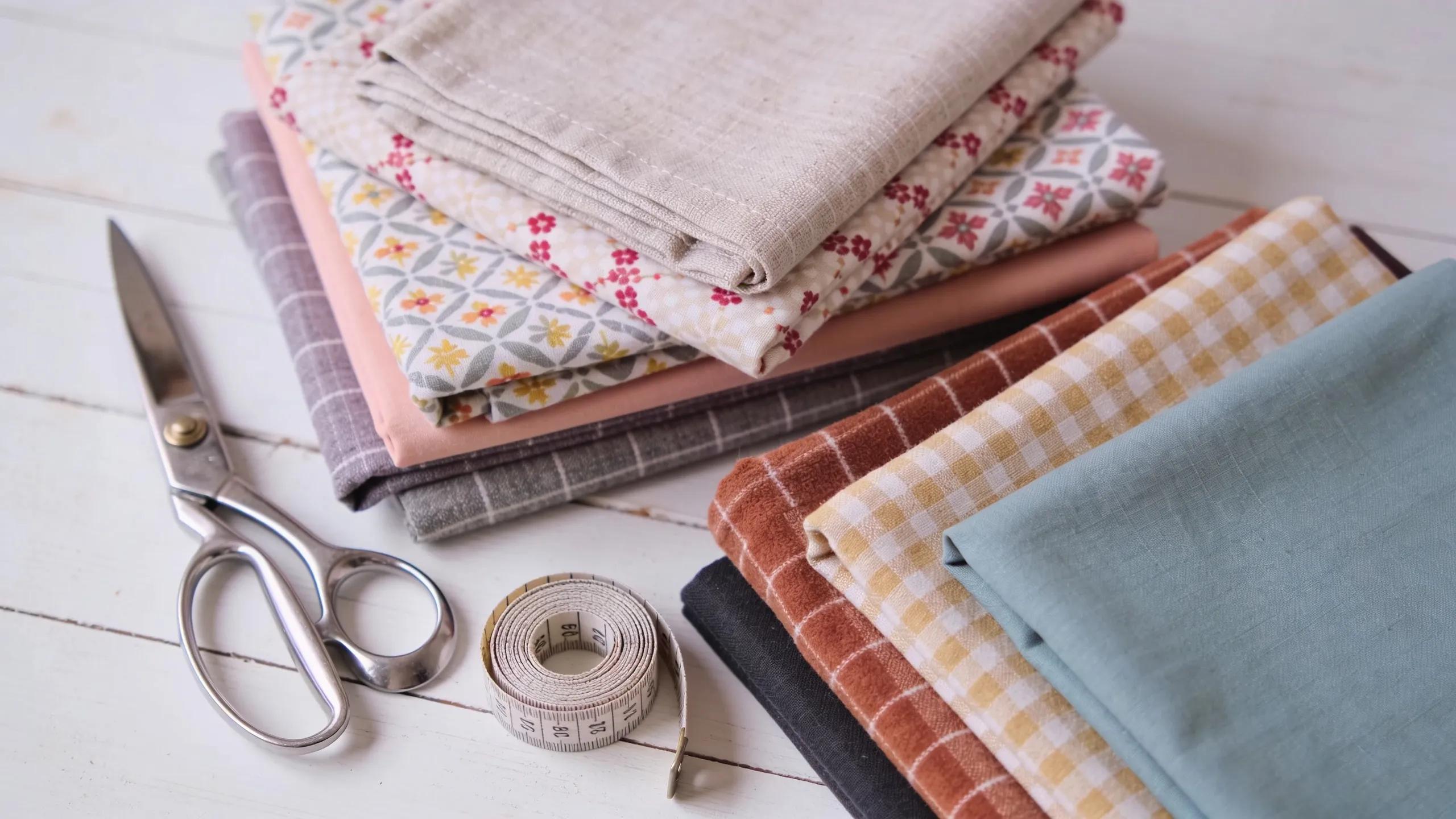 Curated fabric bundles for quilting, illustrating benefits of selection and aesthetic appeal
