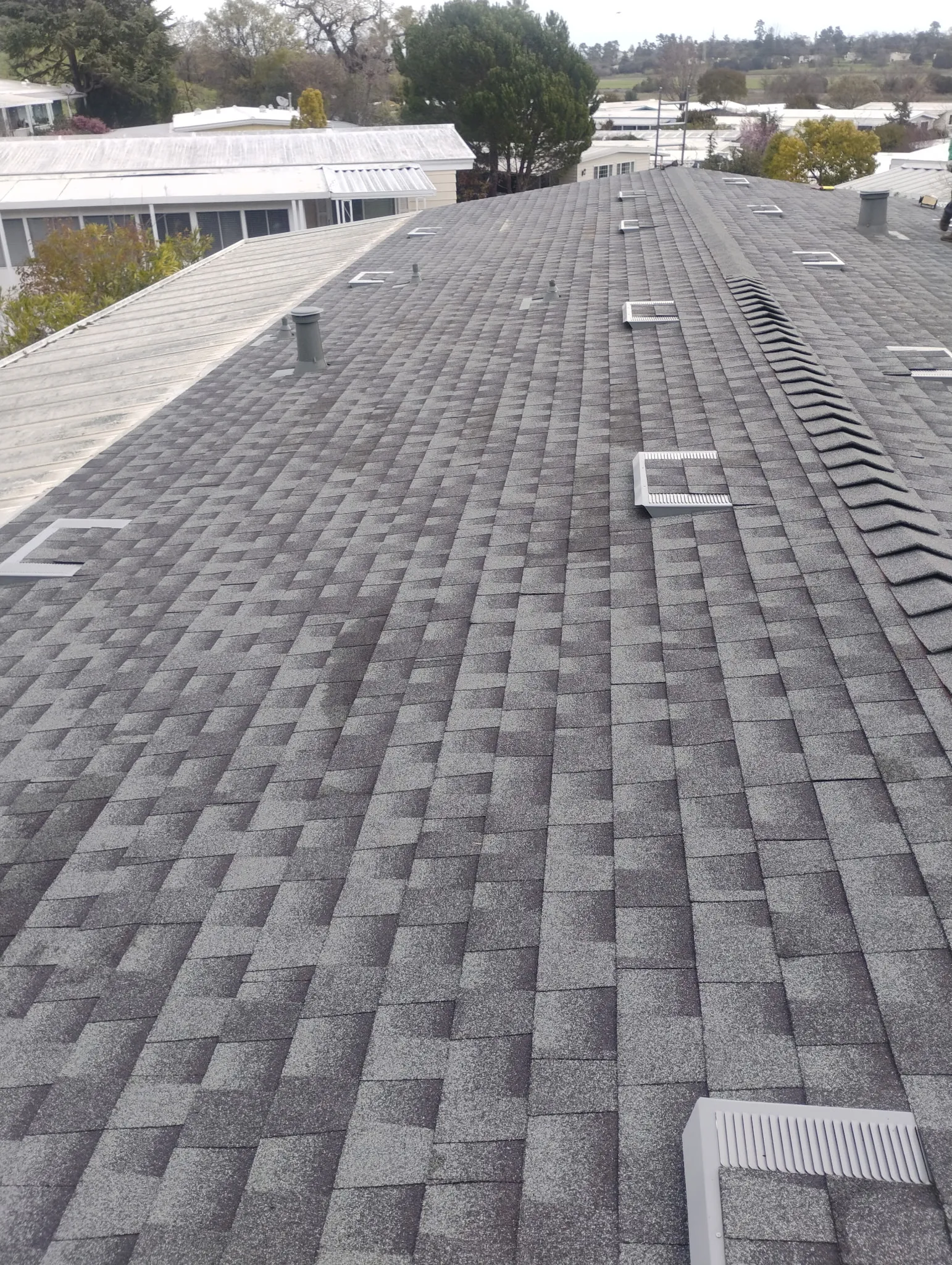 Various roofing materials including metal, tile, and asphalt shingles suitable for solar panel installations