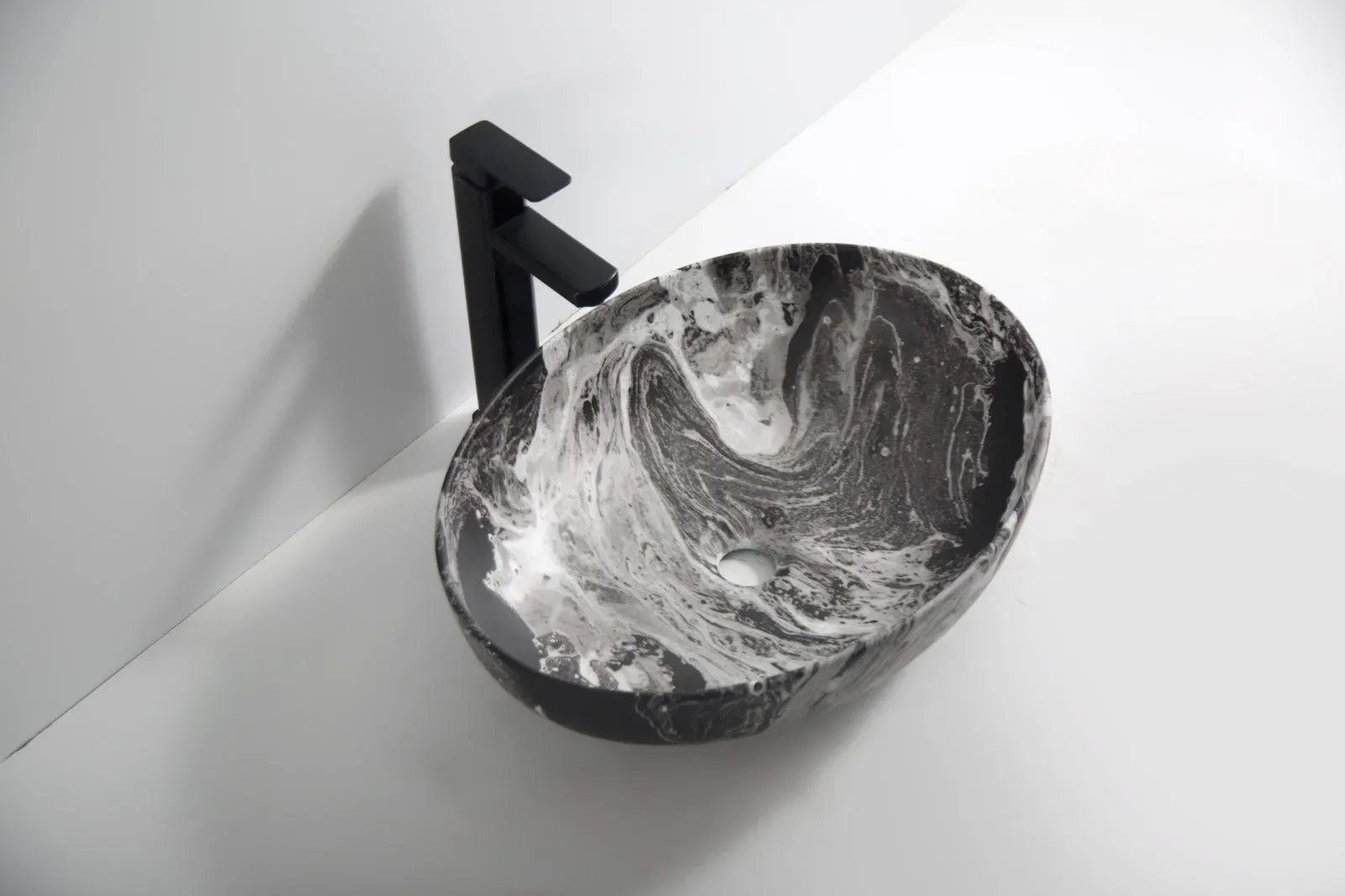 Modern kitchen featuring a waterfall sink with elegant design and seamless water flow