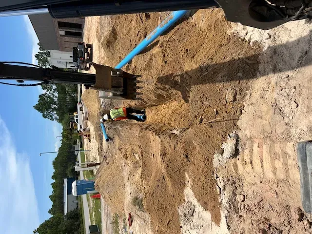 Crew inspecting a storm drain to ensure optimal performance