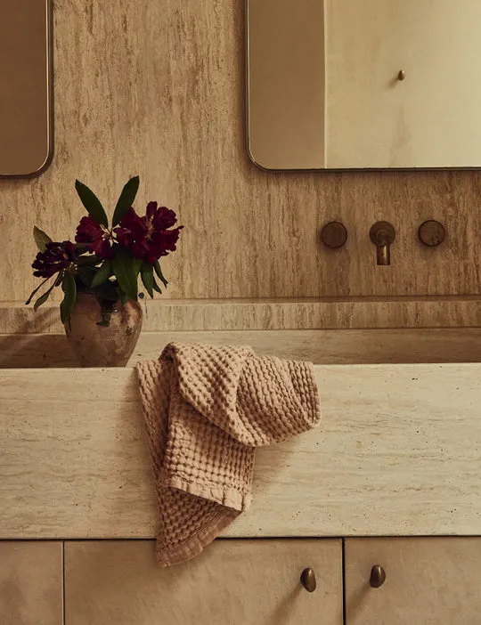 Close-up of waffle towels highlighting the unique weave texture and absorbency properties