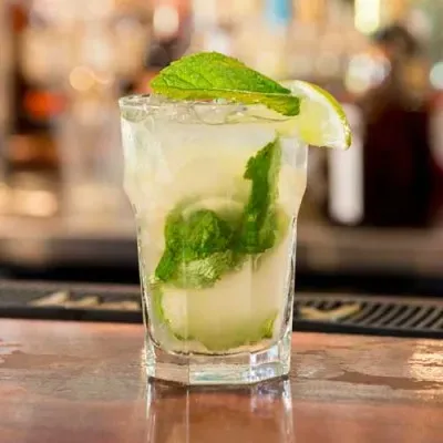 Refreshing Caipirinha cocktail with lime and sugar, embodying Brazilian culture