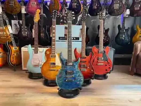 High-end guitar displayed in a music shop, emphasizing its unique features and craftsmanship