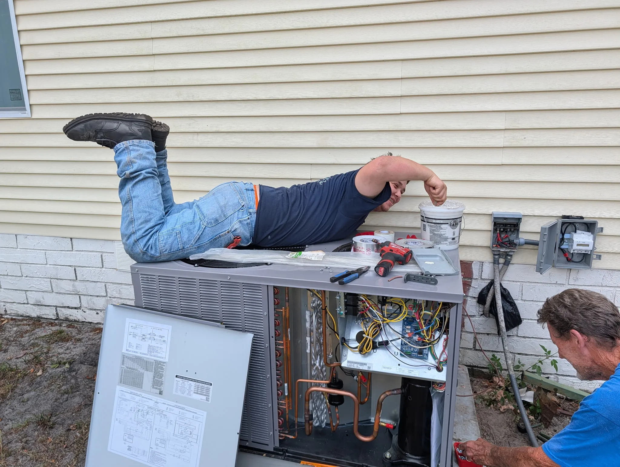 Professional HVAC technician performing AC repair in Florida home