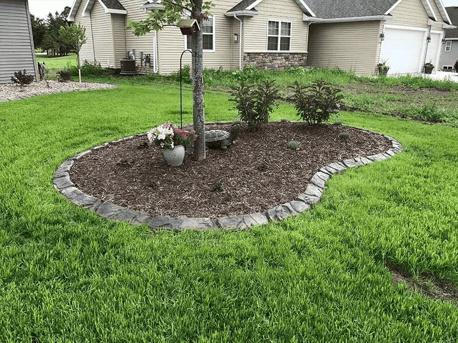 Stamped and Natural Stone Curbing to Personalize Your Landscape