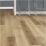 Samples of solid and engineered hardwood flooring on a table