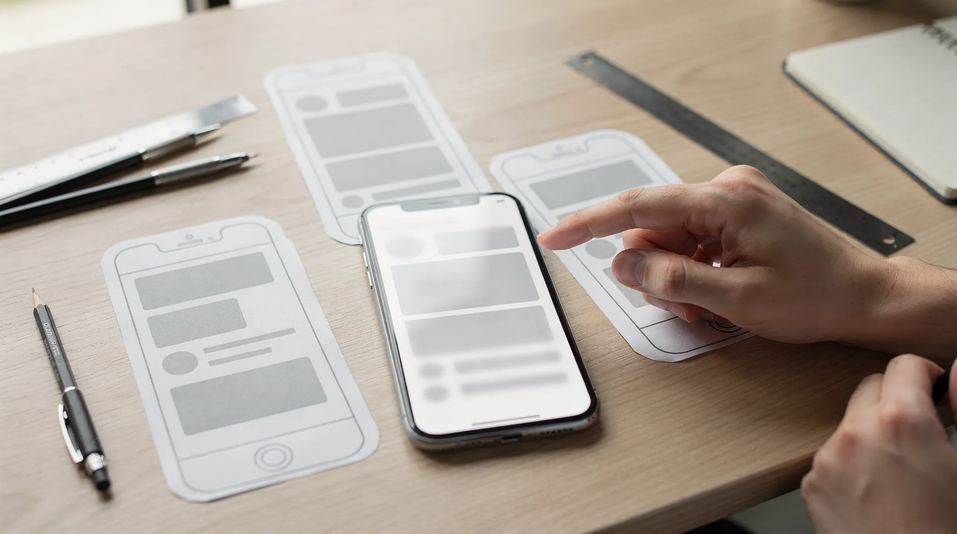 Mobile-first design starts with the smallest screen and progressively enhances the layout for larger devices