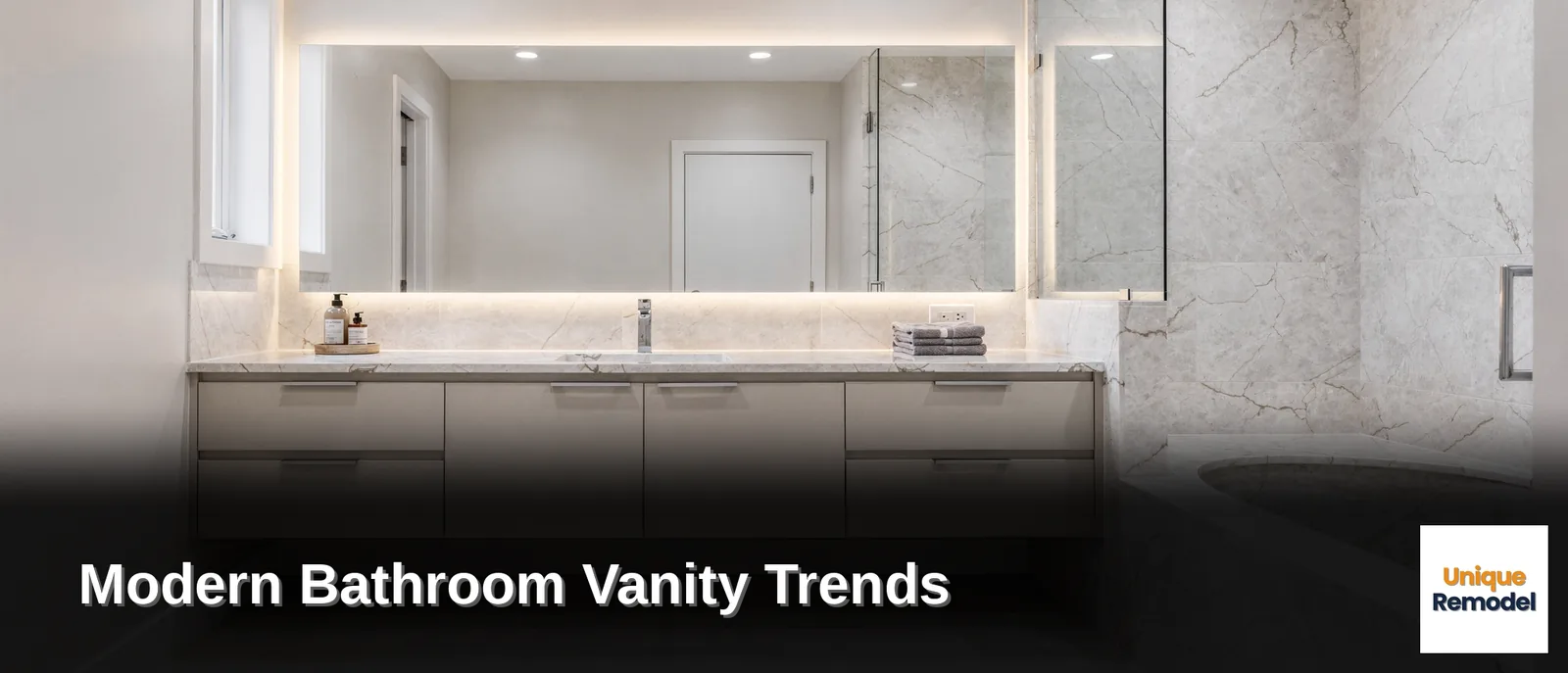 Cultured marble is emerging as a low-maintenance material trend for bathroom vanities and surrounds because