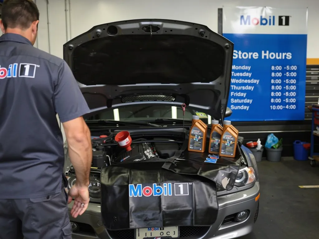 Older sedan running smoothly on the road after an oil change