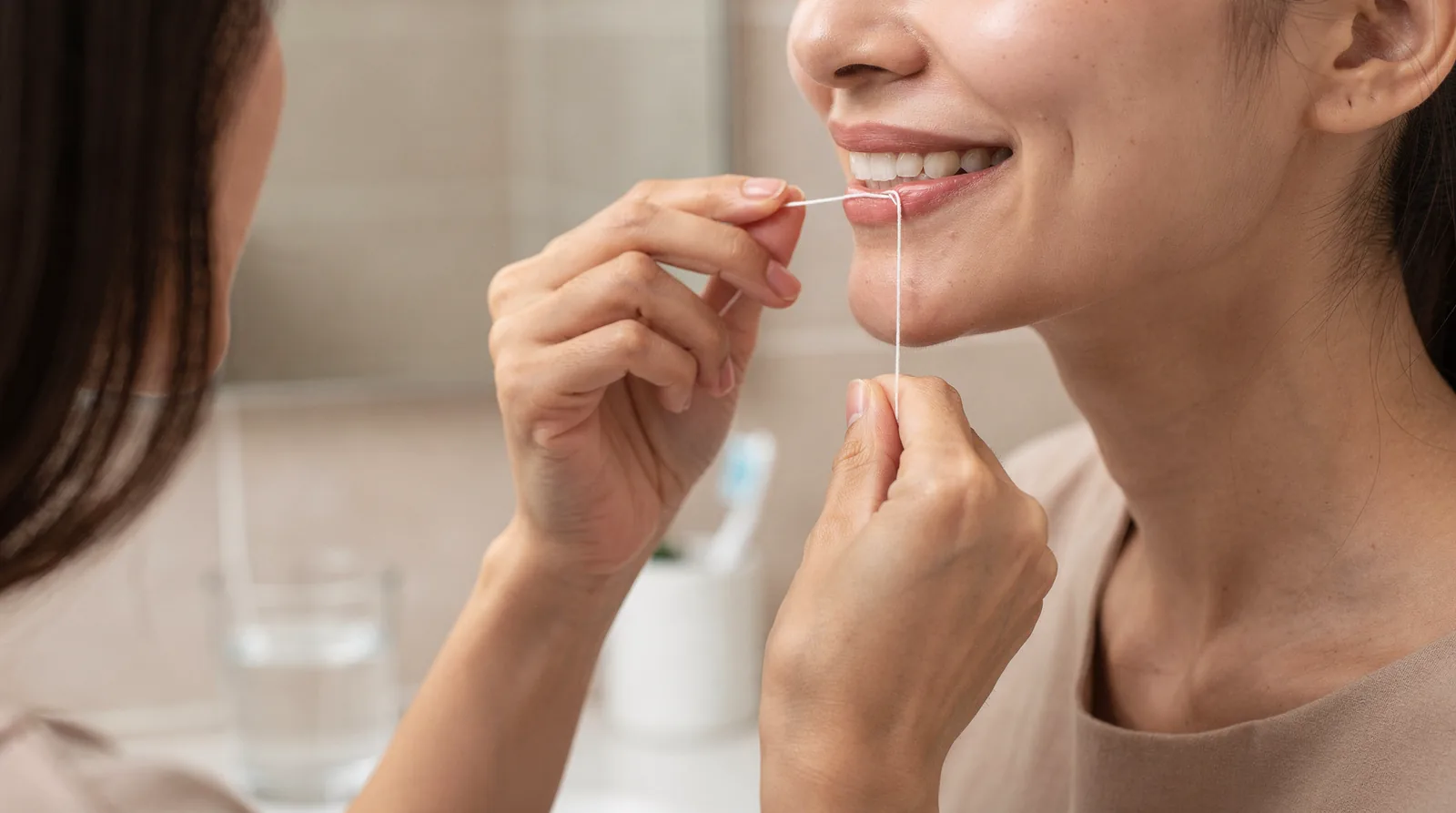 Kids should floss at least once a day, spending two to three minutes to effectively
