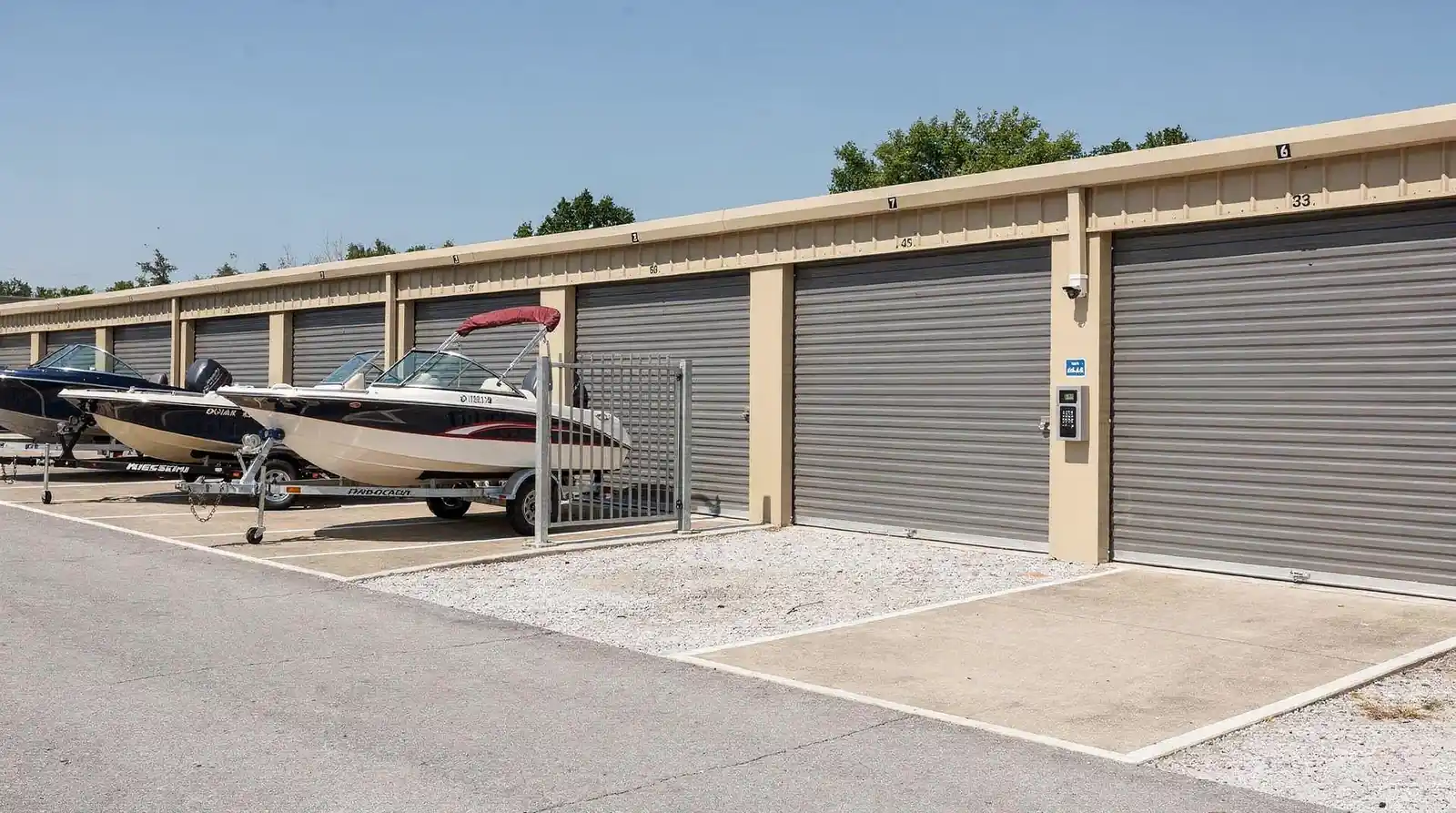 Facilities typically offer either outdoor parking spaces or enclosed boat storage at ground level, giving