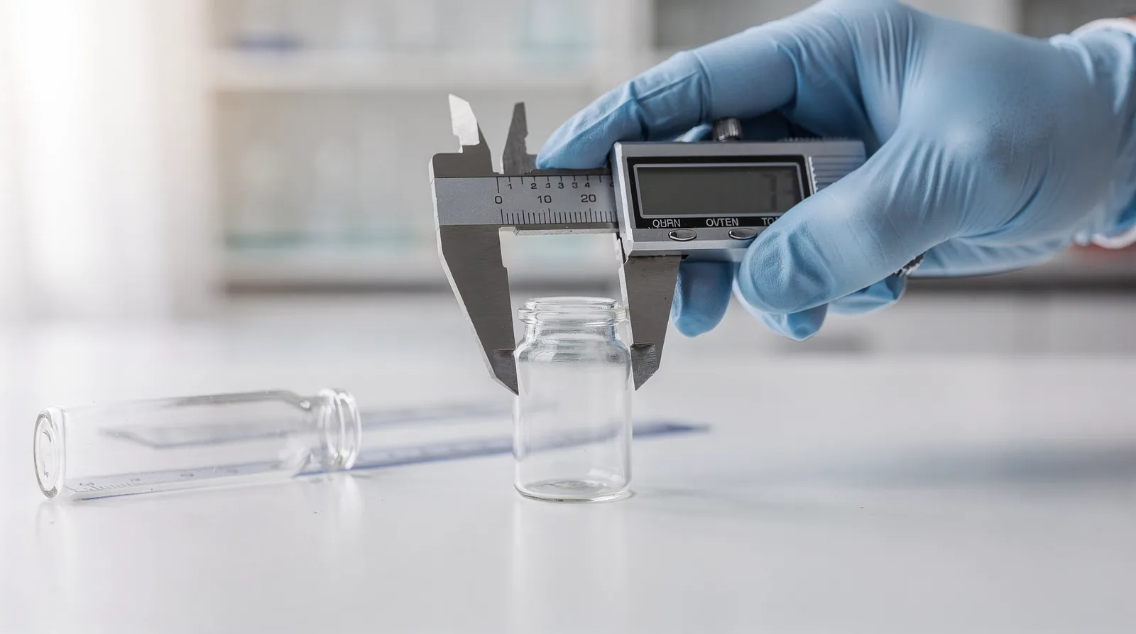 A standard 3ml serum vial is a tall, narrow container sized for compact, hand-held use