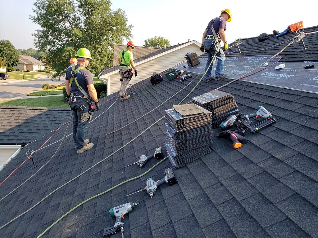 Chandler Roofing crew in full safety gear repairing a roof from start to finish