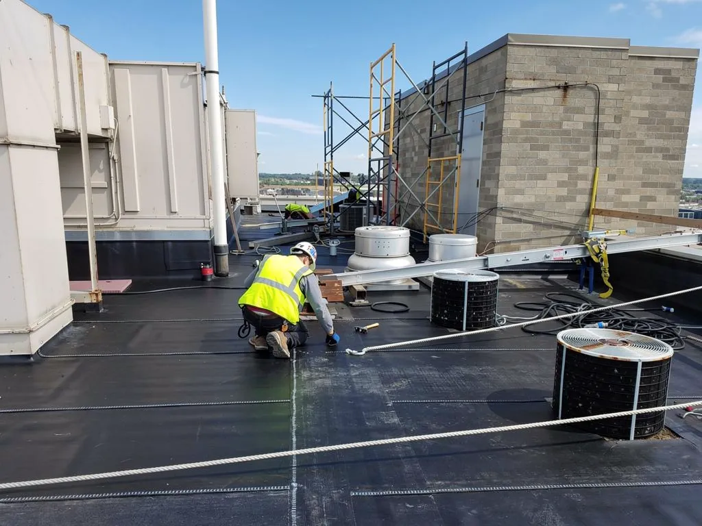 When Should You Repair vs. Replace Your EPDM Roof in Minnesota
