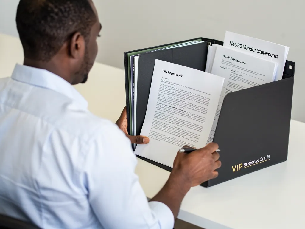 Entrepreneur setting up vendor credit accounts to build business credit