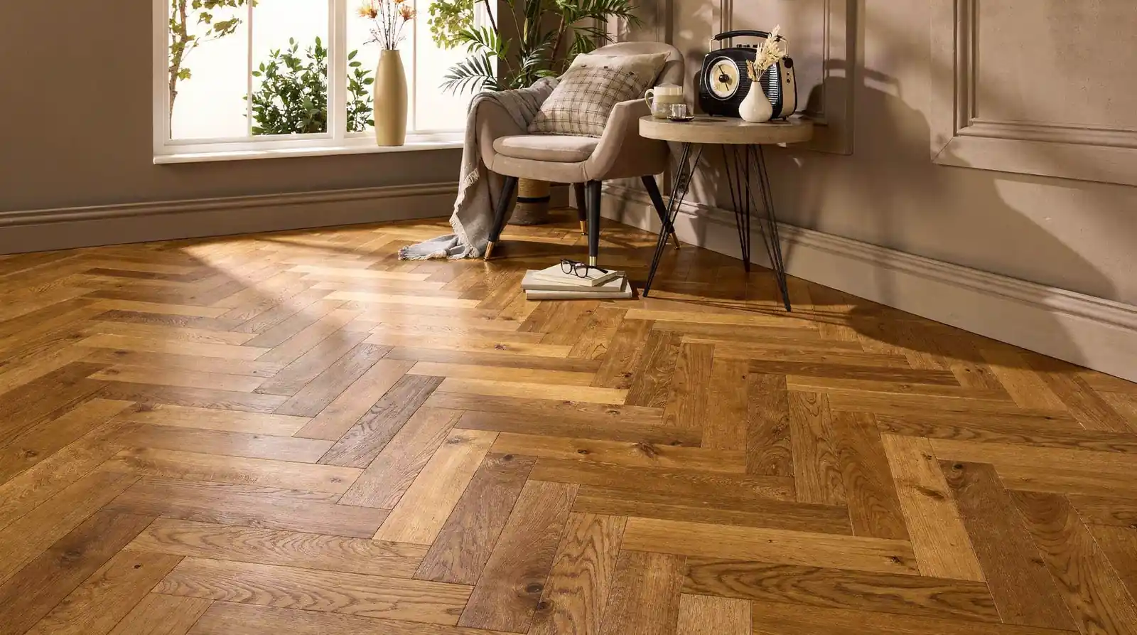 Flooring patterns create rhythm and scale that directly influence where furniture is placed and how