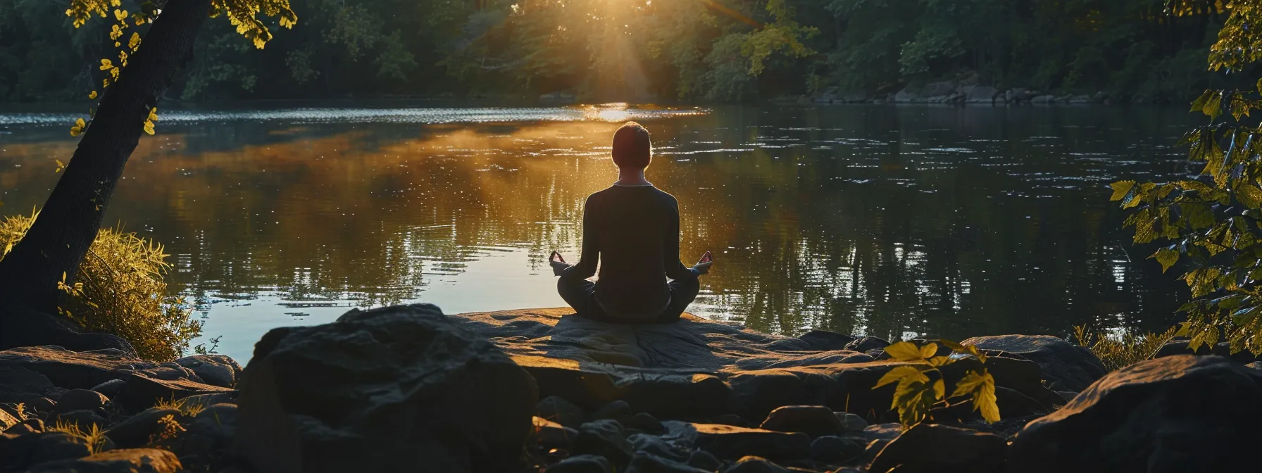 a person practicing mindfulness in a serene natural setting.