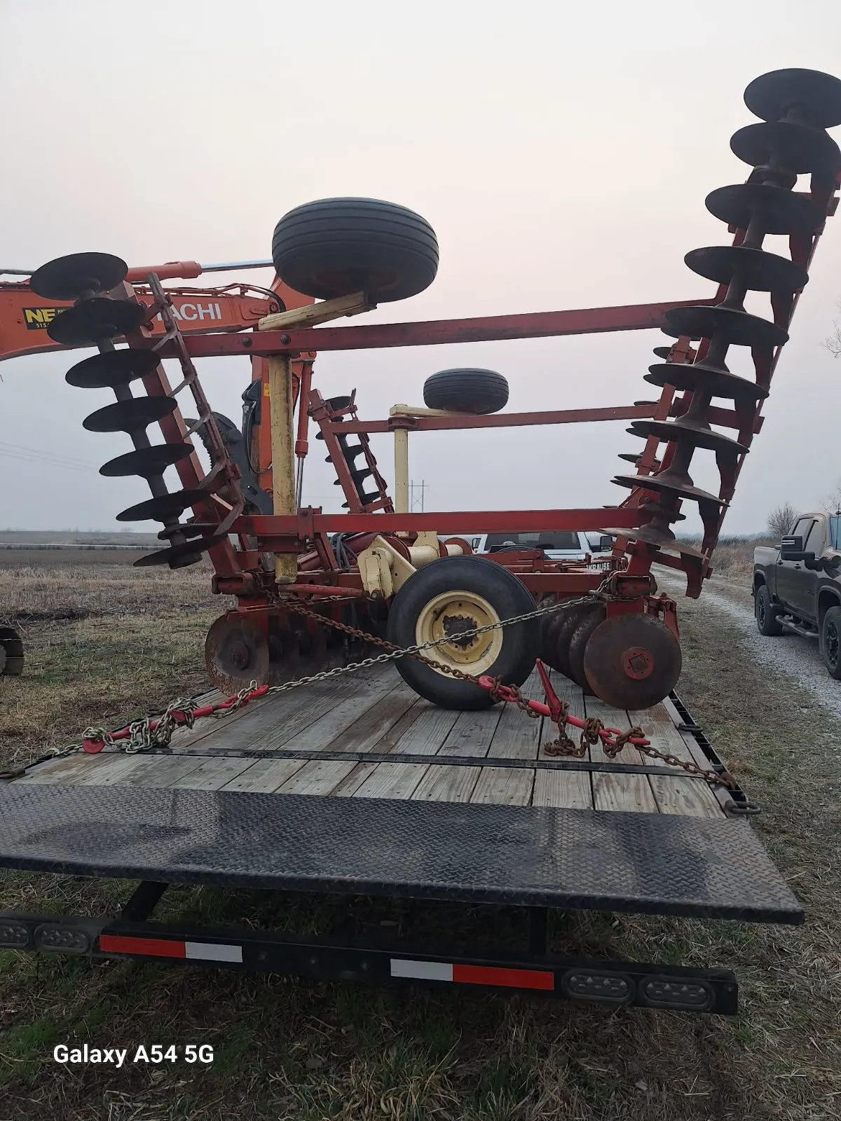 Leadfoot Rentals Tilt Deck loaded with a Plow 