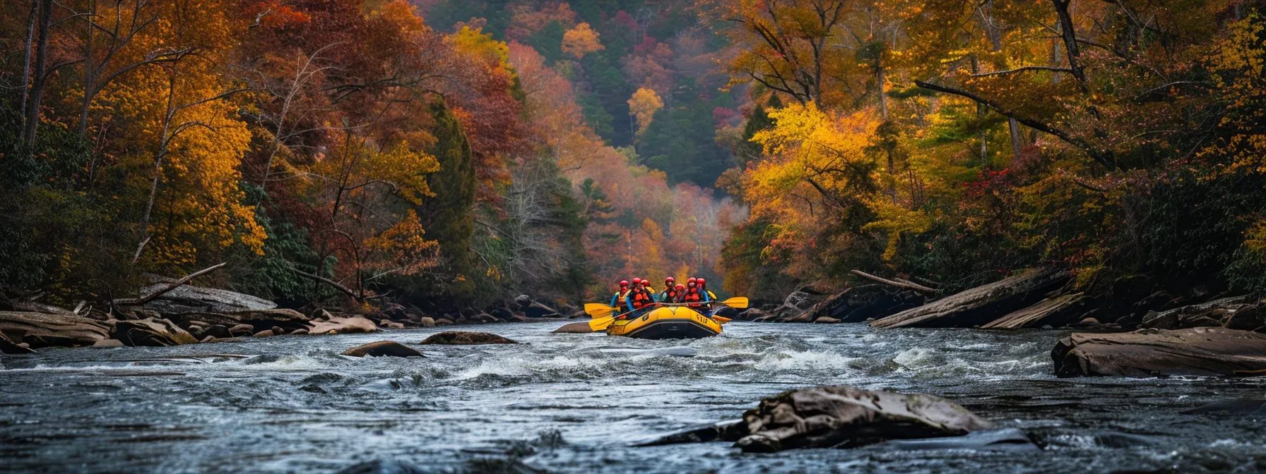 rafting through vibrant autumn foliage on the ocoee river.