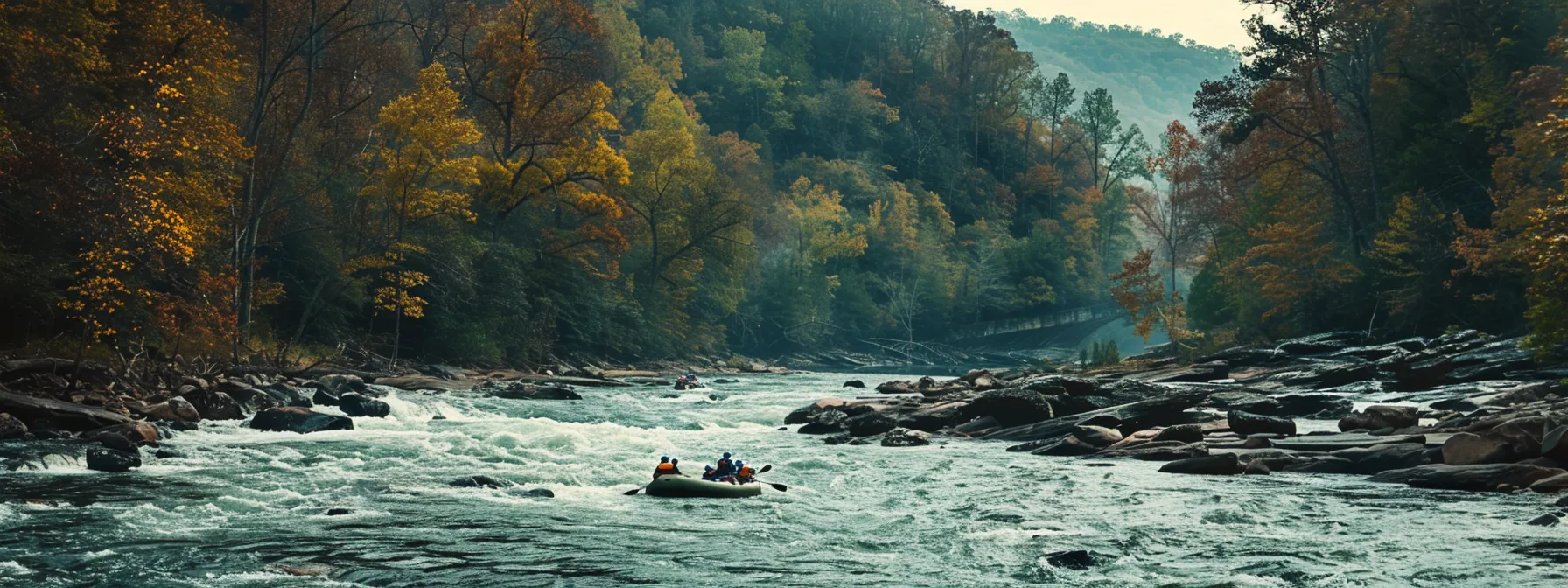 rafters navigating through rapids on the middle ocoee river.