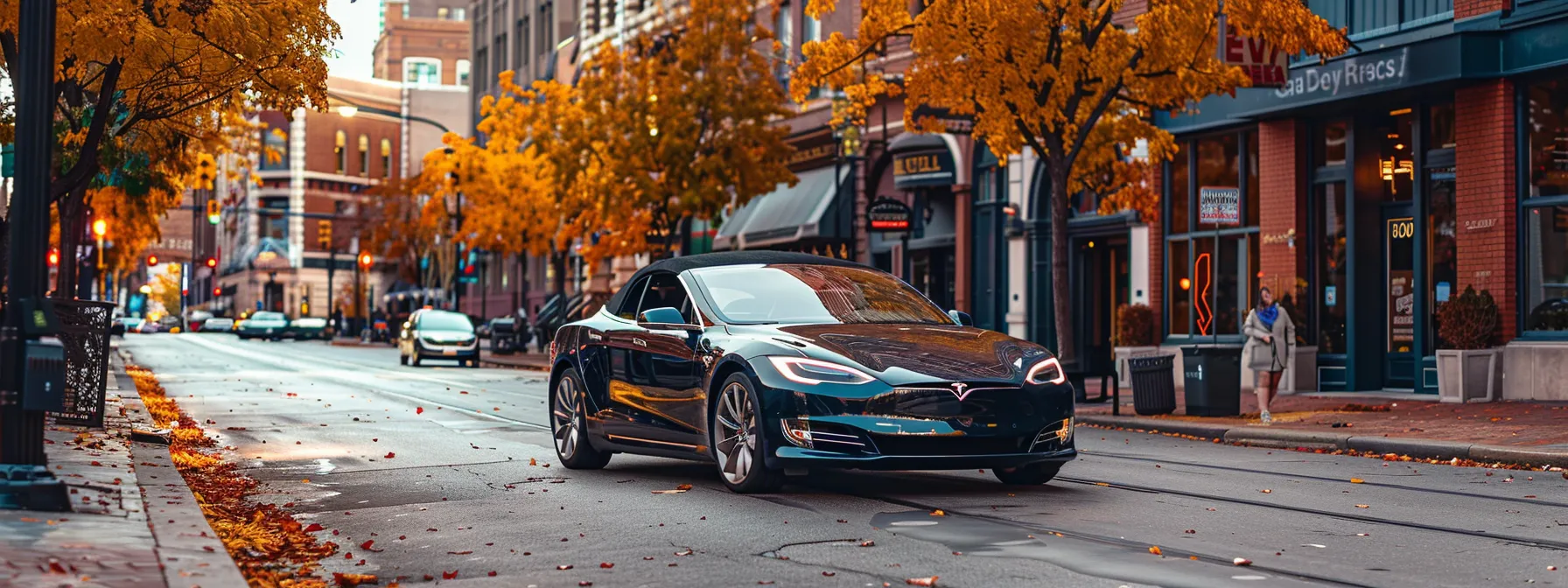 a sleek tesla model s convertible cruising through the vibrant streets of indianapolis, showcasing the city's growing interest in luxury cars.