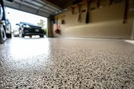 Demonstration of polyaspartic floor's durability with a heavy tool drop in a garage setting Demonstration of polyaspartic floor's durability with a heavy tool drop in a garage setting
