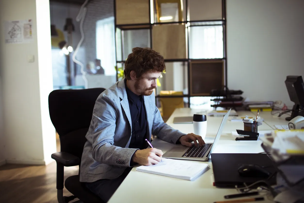Private Investigator working at his office in Chelmsford