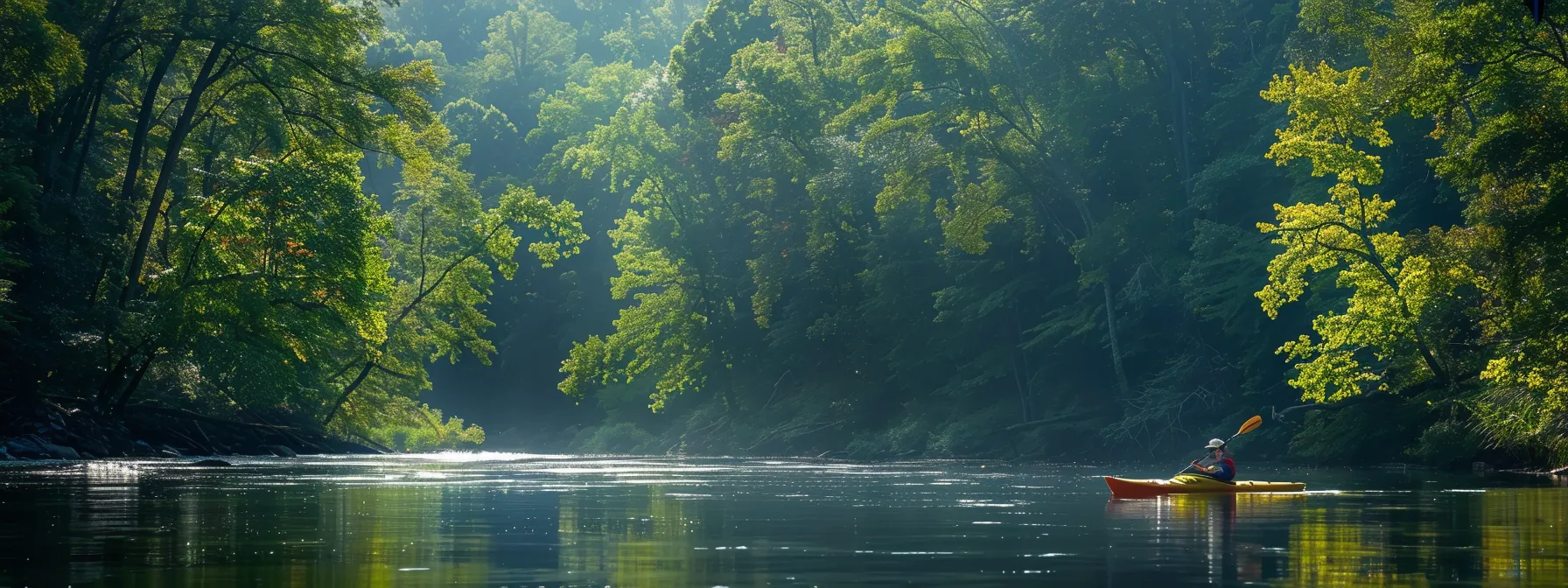 kayakers paddling down the scenic sequatchie river on a sunny day.