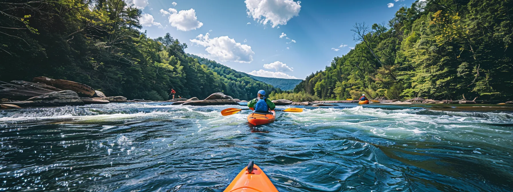 kayakers navigating gently flowing waters surrounded by beautiful scenic views on the middle ocoee.