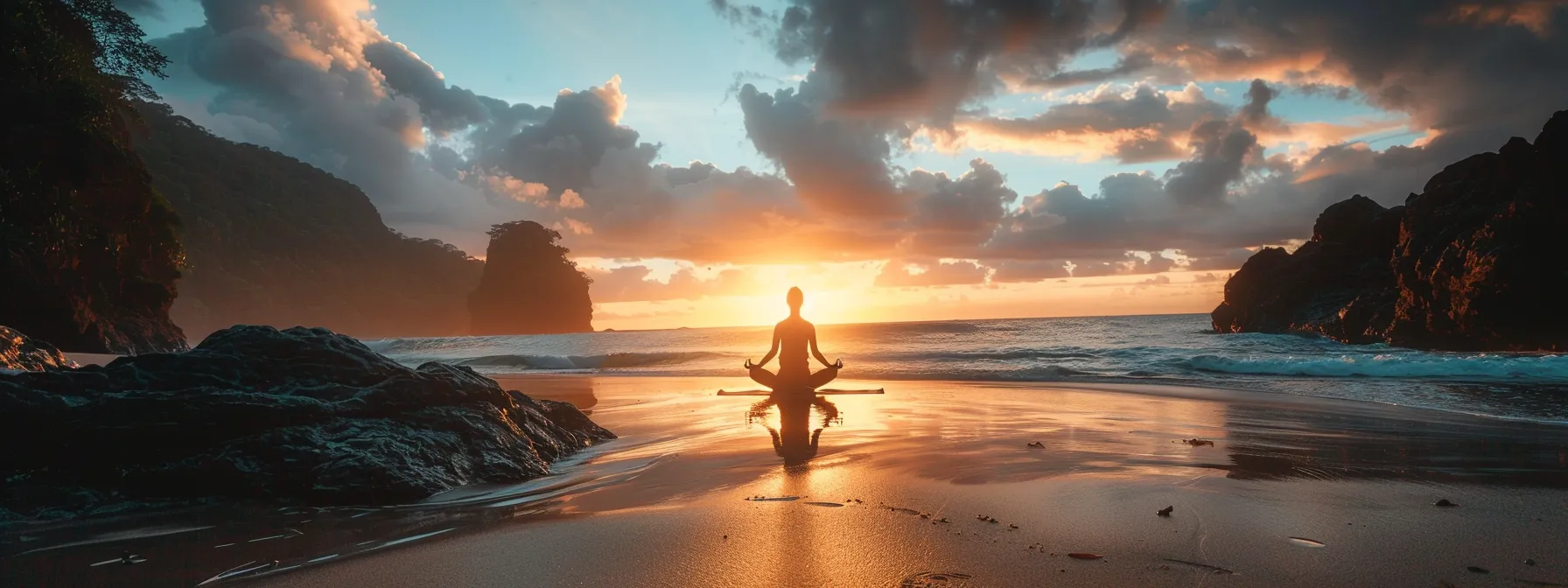 a person practicing yoga on a serene beach at sunrise.