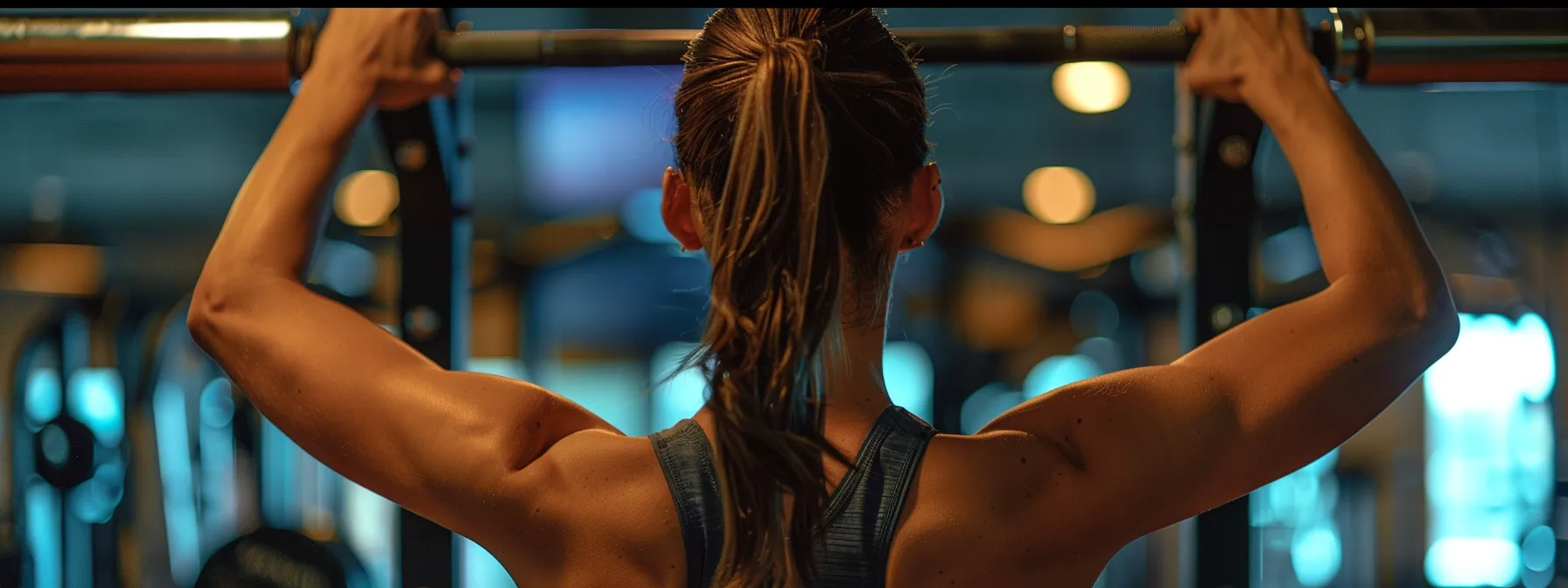 a person lifting weights at synergy fitness gym.