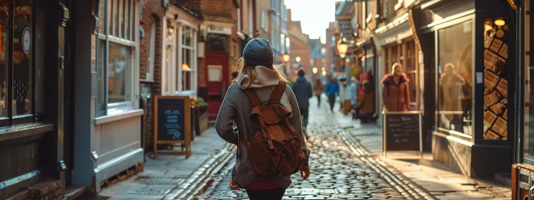 a traveler walks through the charming streets of york, absorbing the blend of history and modernity.