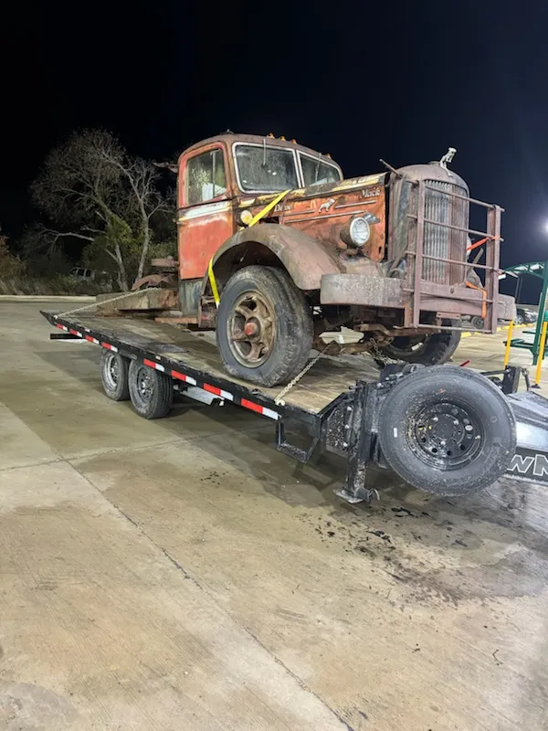 Leadfoot Rentals Tilt Deck Trailer loaded with a Mac Truck