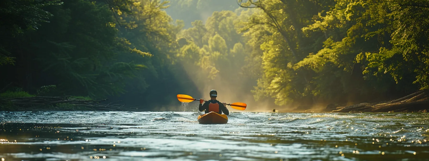 kayakers navigating through exhilarating rapids on the hiwassee river.