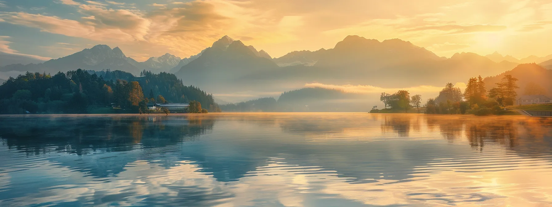 a breathtaking view of a serene mountain landscape at sunrise, where golden rays illuminate the misty peaks and reflect off a tranquil lake, creating a scene of pure tranquility and natural beauty. Benefits of Good Sign Up Bonuses for Credit Cards Revealed