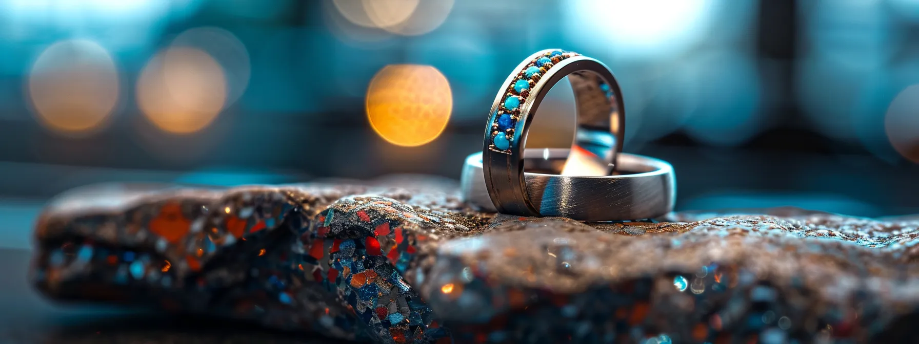 a close-up shot of a stunning custom tungsten ring showcasing its sleek design alongside vibrant gemstones like turquoise and lapis lazuli, set against a modern urban office backdrop with soft, focused lighting to highlight the ring's durability and brilliance. a close-up shot of a stunning custom tungsten ring showcasing its sleek design alongside vibrant gemstones like turquoise and lapis lazuli, set against a modern urban office backdrop with soft, focused lighting to highlight the ring's durability and brilliance.