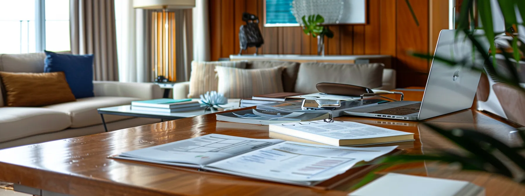 a luxurious coastal airbnb interior featuring sleek, modern furnishings and hotel-quality linens, radiating a high-end vacation vibe while highlighting the meticulous organization of rental management documents and financial planning materials on a stylish desk.