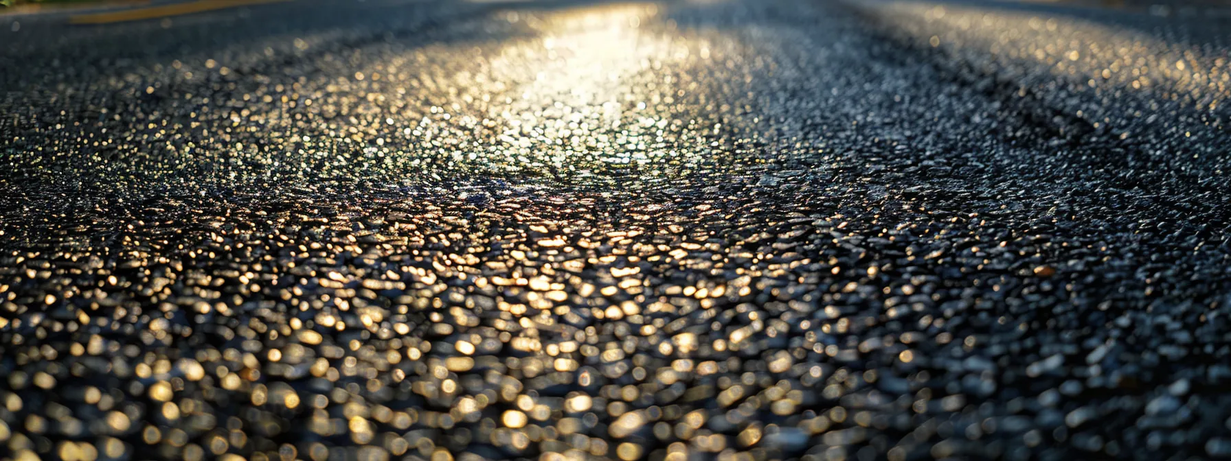 a meticulously designed urban roadway showcases expertly graded asphalt, reflecting the intricate relationship between precise grading techniques and the durability of pavement under varying traffic and environmental conditions.