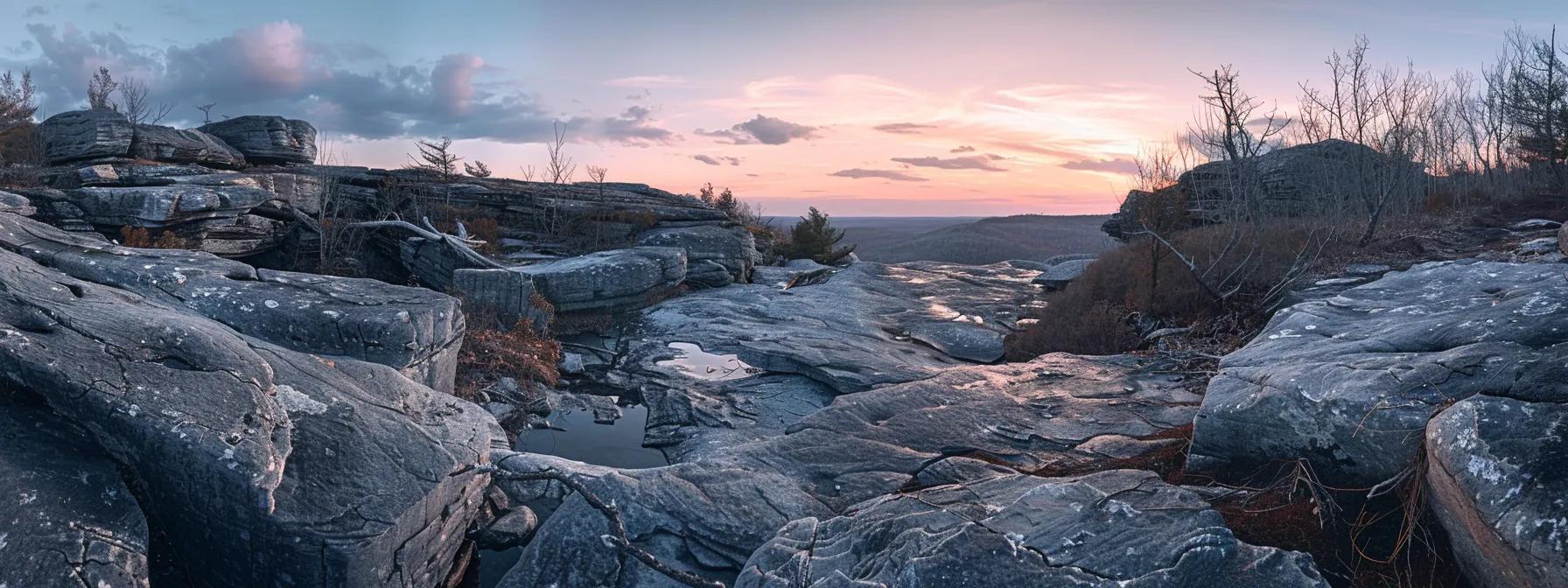 a panoramic view from a hiking trail on blue ridge mountain, showcasing dramatic rock formations, layered ridges, and a breathtaking sunset that enhances the vibrant colors of the landscape. a panoramic view from a hiking trail on blue ridge mountain, showcasing dramatic rock formations, layered ridges, and a breathtaking sunset that enhances the vibrant colors of the landscape.