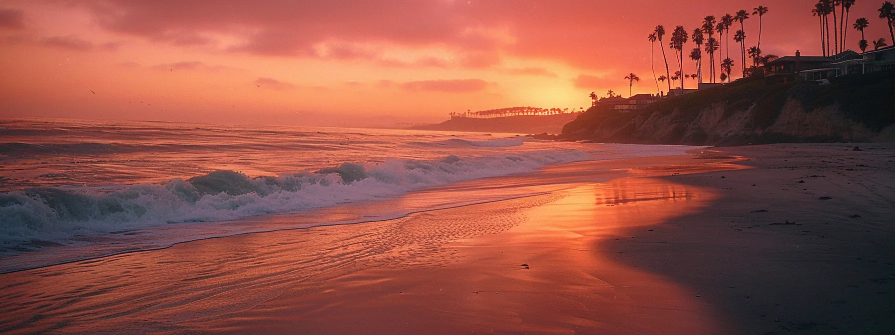 a radiant sunset bathes a tranquil beach in warm hues of orange and pink, with gentle waves lapping against the shore and silhouetted palm trees swaying softly in the breeze. Benefits of Good Sign Up Bonuses for Credit Cards Revealed