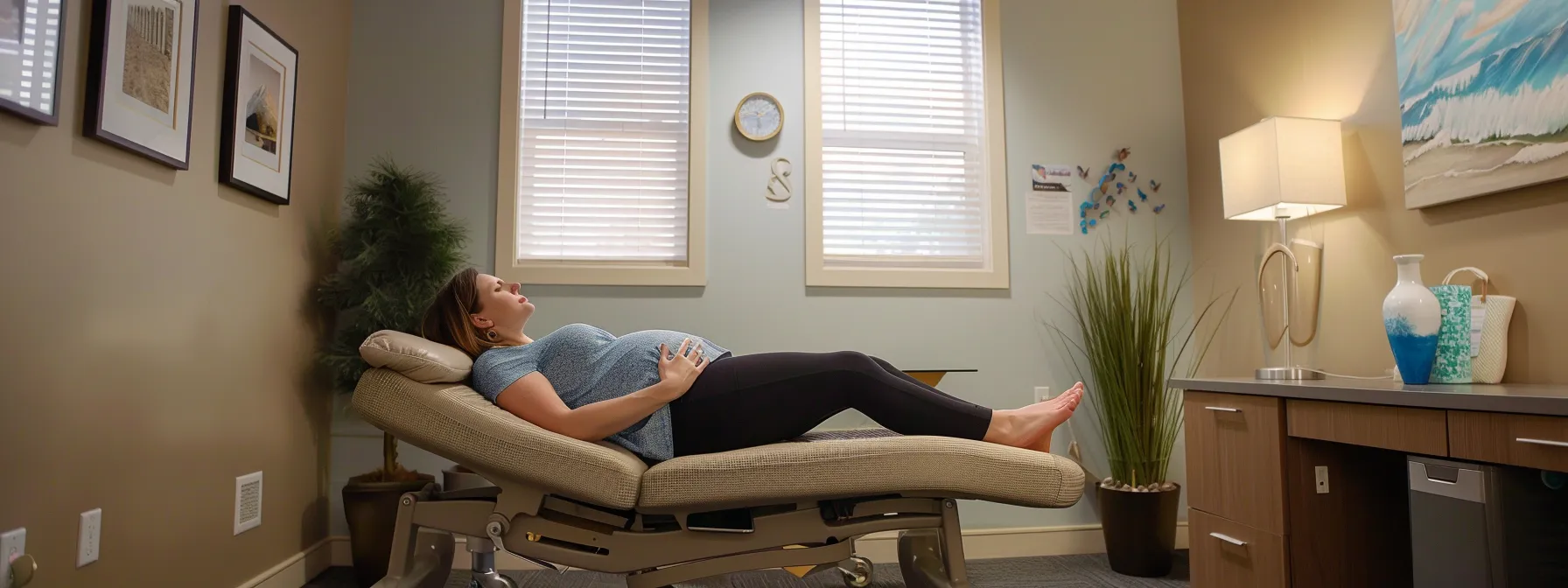 a serene and inviting chiropractic office setting features a pregnant woman comfortably lying on an adjustment table, surrounded by soft lighting and soothing decor, illustrating the supportive care she receives for her pregnancy concerns. a serene and inviting chiropractic office setting features a pregnant woman comfortably lying on an adjustment table, surrounded by soft lighting and soothing decor, illustrating the supportive care she receives for her pregnancy concerns.