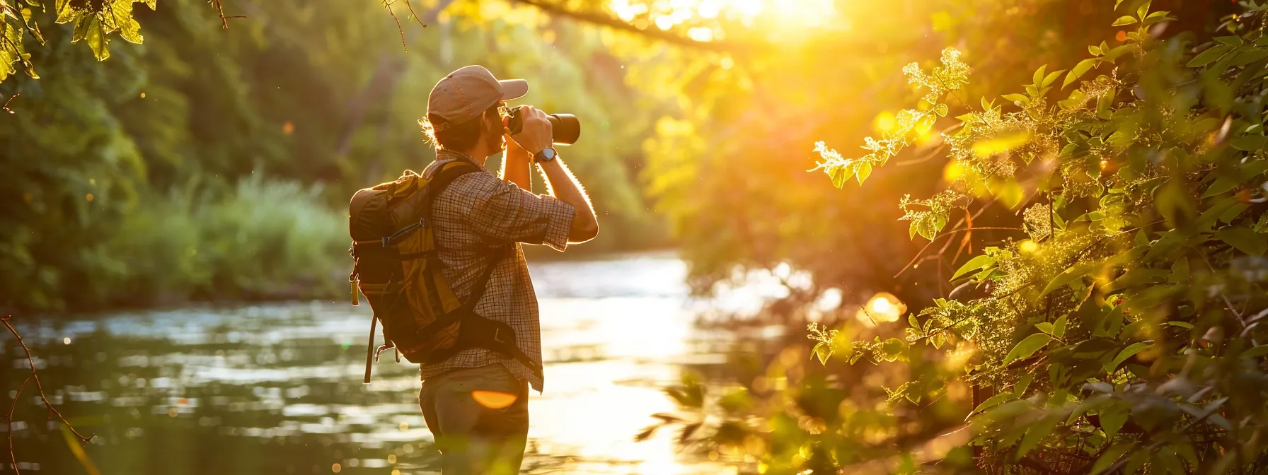 a serene scene captures a dedicated birdwatcher, equipped with high-quality binoculars and an open field guide, immersed in the lush greenery along the ocoee river, with the sun filtering through the trees, creating a dappled light effect that highlights the vibrant colors of the surrounding nature.