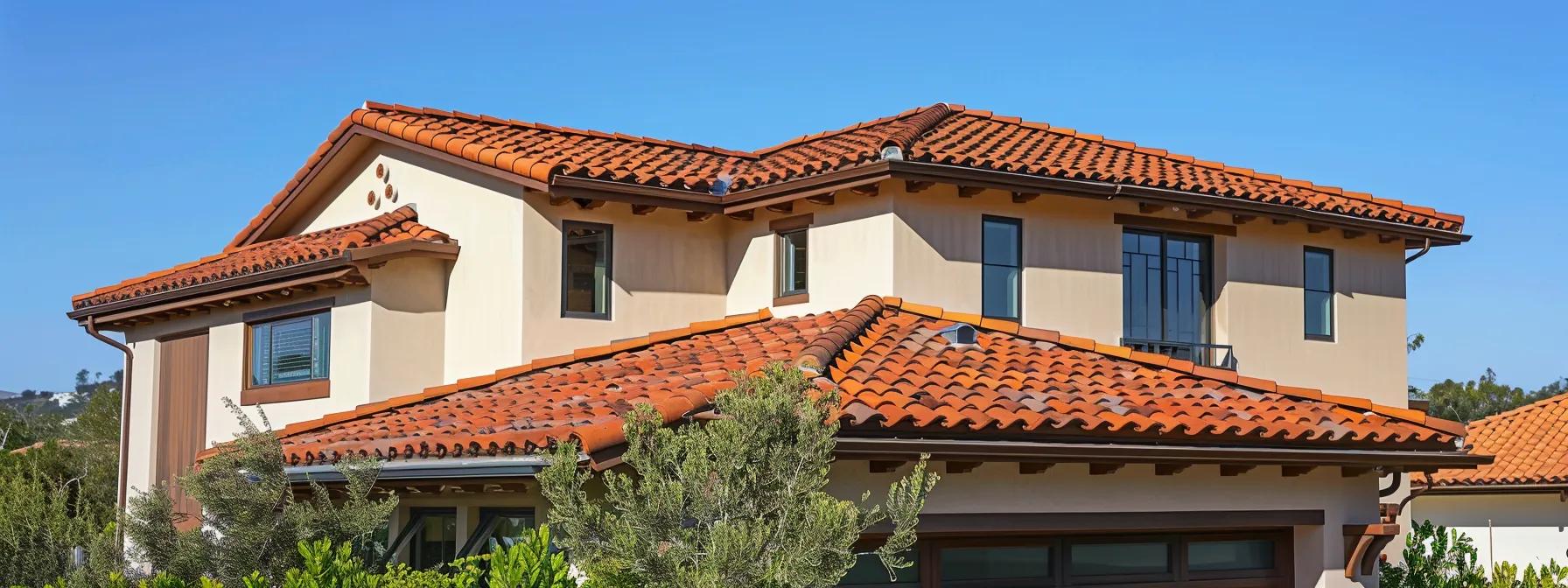 a vibrant, modern-home exterior showcasing a stunning tile roof under a clear blue sky in an upscale irvine neighborhood, emphasizing the durability and aesthetic appeal of tile roofing for homeowners. a vibrant, modern-home exterior showcasing a stunning tile roof under a clear blue sky in an upscale irvine neighborhood, emphasizing the durability and aesthetic appeal of tile roofing for homeowners.
