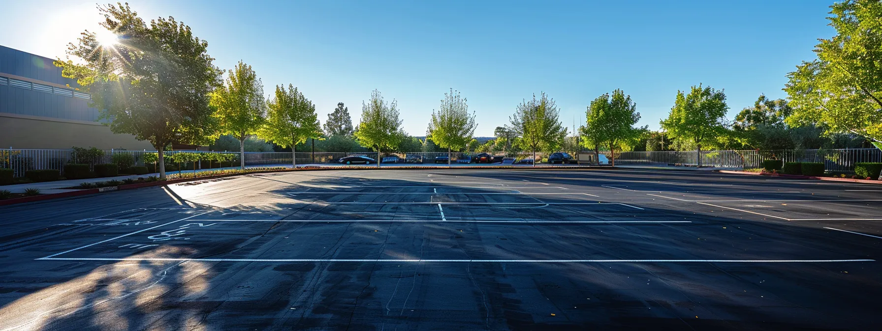 a vibrant, sunlit high-traffic parking lot showcases a flawlessly paved surface, emphasizing the durable material and expert craftsmanship that enhance its functionality and aesthetic appeal. a vibrant, sunlit high-traffic parking lot showcases a flawlessly paved surface, emphasizing the durable material and expert craftsmanship that enhance its functionality and aesthetic appeal.