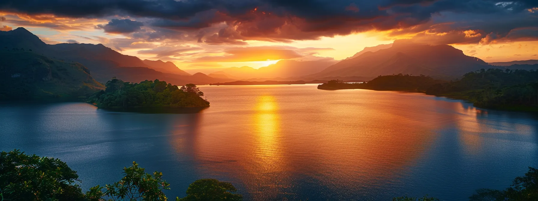 a vibrant sunset casts a golden glow over a serene lake, reflecting the fiery hues of the sky and surrounding lush greenery.