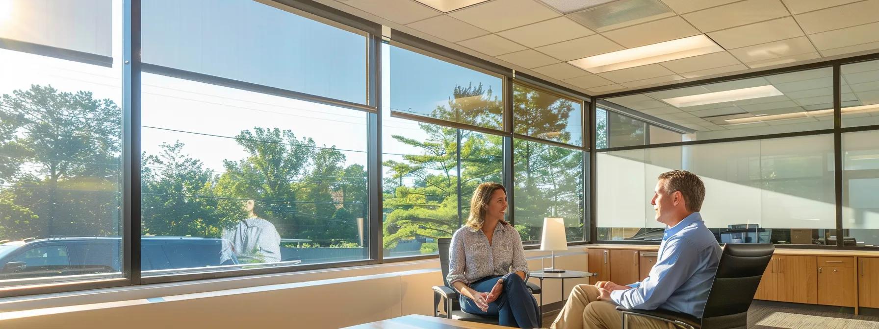 an authoritative saint louis roofing contractor confidently discusses current trends and materials with a homeowner inside a modern, well-lit office, highlighting a collaboration built on expertise and trust. an authoritative saint louis roofing contractor confidently discusses current trends and materials with a homeowner inside a modern, well-lit office, highlighting a collaboration built on expertise and trust.