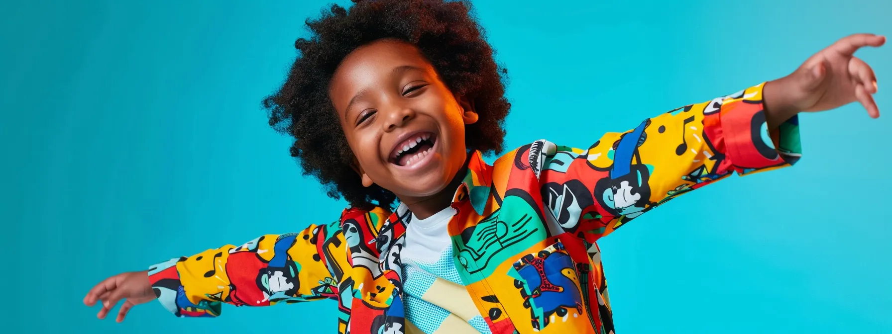 a child happily holding up a vibrant jordan craig kids shirt, showcasing the quality and authenticity of the clothing brand. a child happily holding up a vibrant jordan craig kids shirt, showcasing the quality and authenticity of the clothing brand.