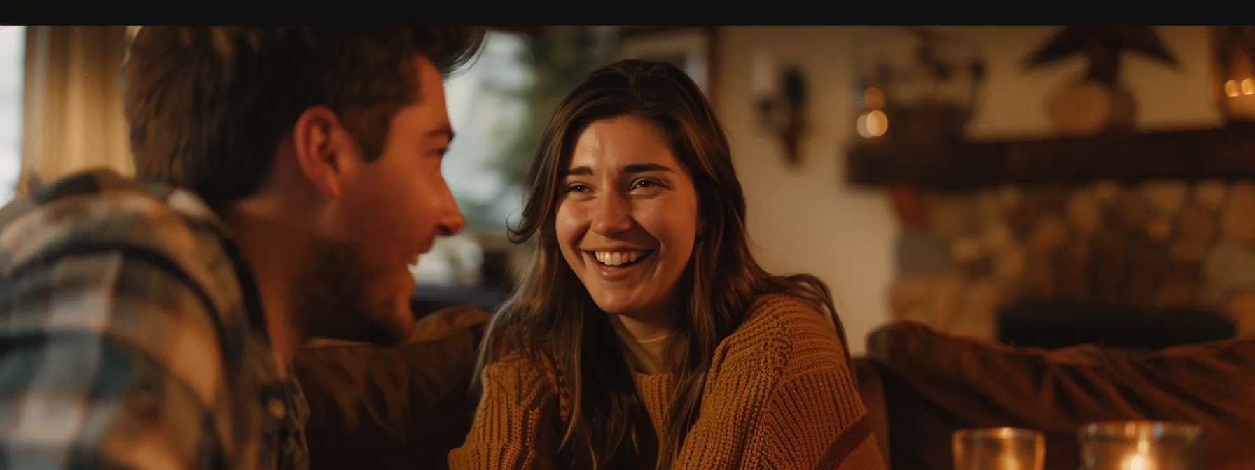 a couple smiling as they confidently negotiate prices with a real estate agent in a cozy, affordable home in lake country, bc. a couple smiling as they confidently negotiate prices with a real estate agent in a cozy, affordable home in lake country, bc.