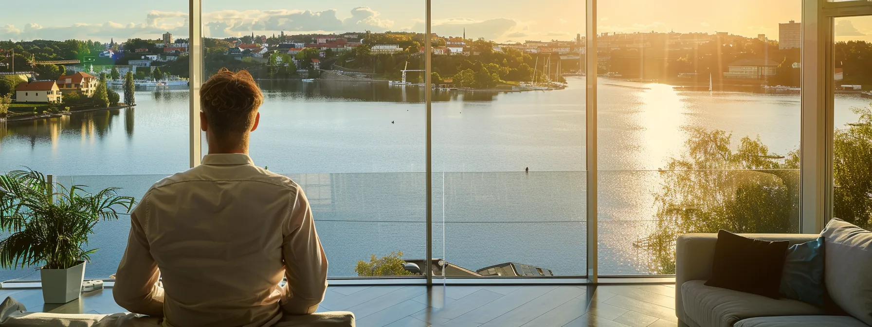a real estate investor overlooking a diverse portfolio of renovated properties with a serene lake view in the background. a real estate investor overlooking a diverse portfolio of renovated properties with a serene lake view in the background.
