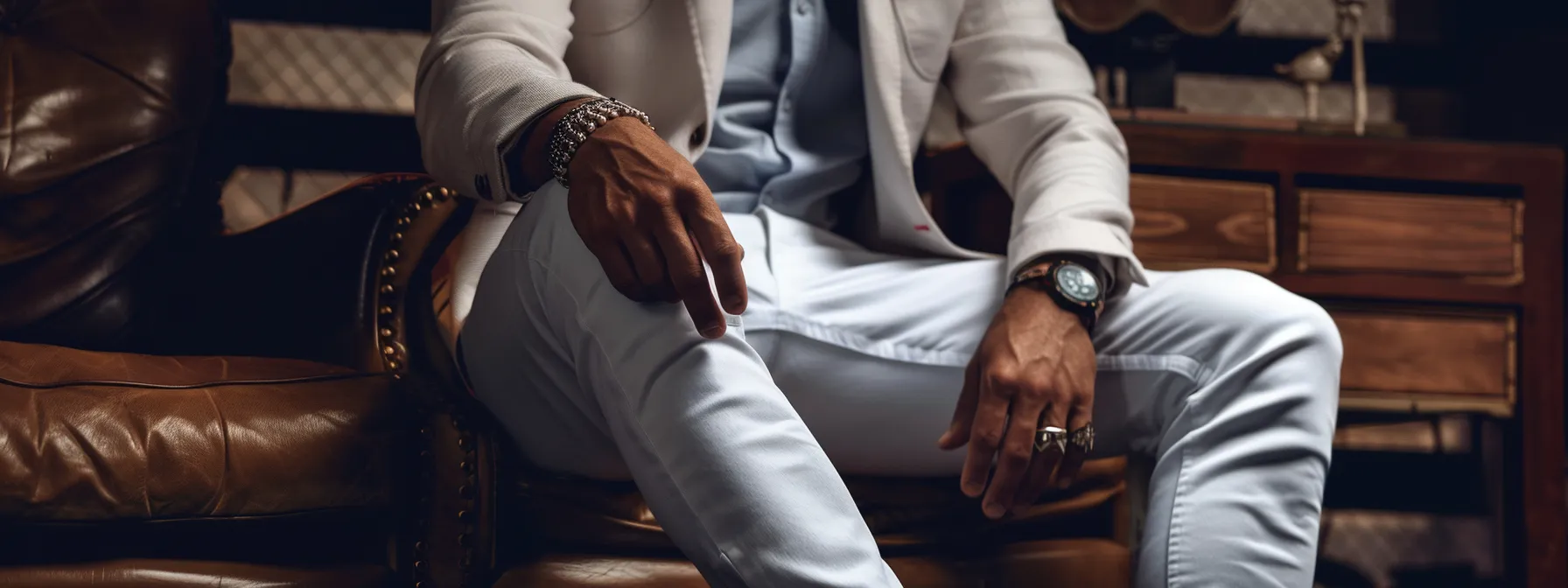 a stylish man confidently pairs white stacked jeans with a tailored blazer and sleek accessories, embodying a sophisticated yet versatile look. a stylish man confidently pairs white stacked jeans with a tailored blazer and sleek accessories, embodying a sophisticated yet versatile look.